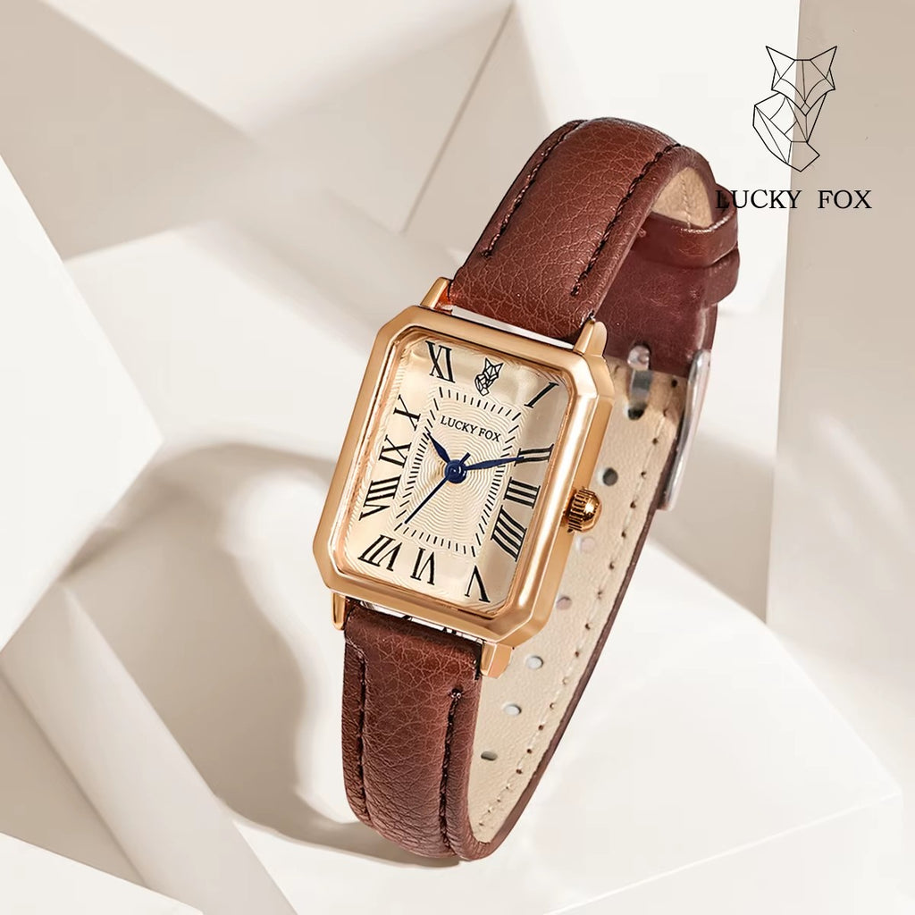 My Store LUCKY FOX rectangular watch with rose gold case, cream dial, Roman numerals, and brown leather strap.