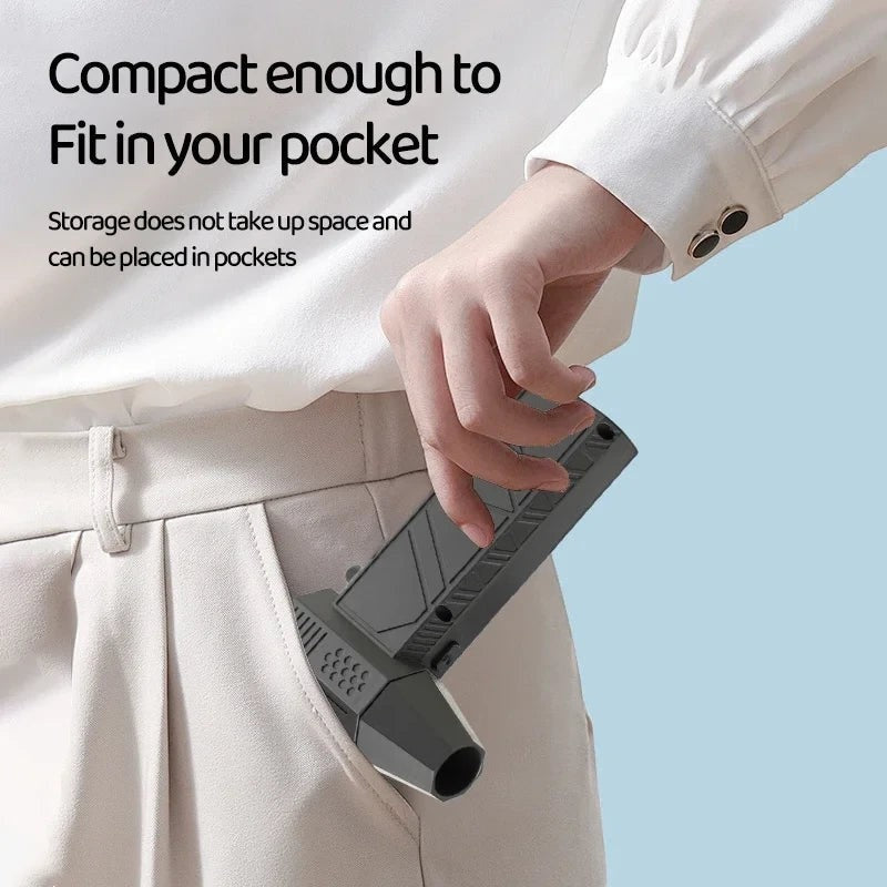 My Store portable handheld electric air duster being placed into a pocket for compact storage