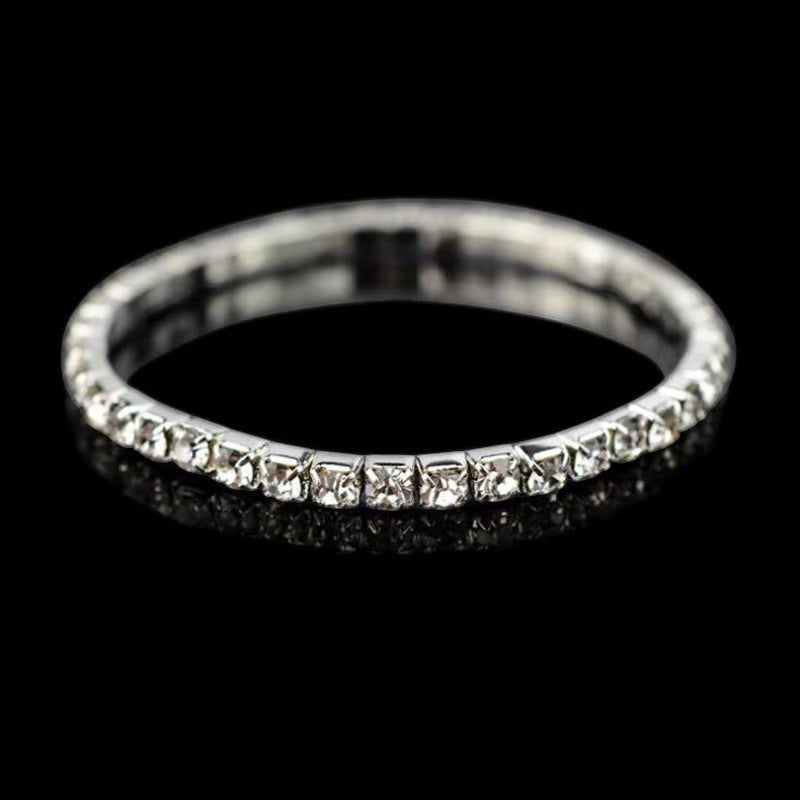 My Store elegant tennis bracelet featuring a continuous row of sparkling clear crystals in a polished silver setting.