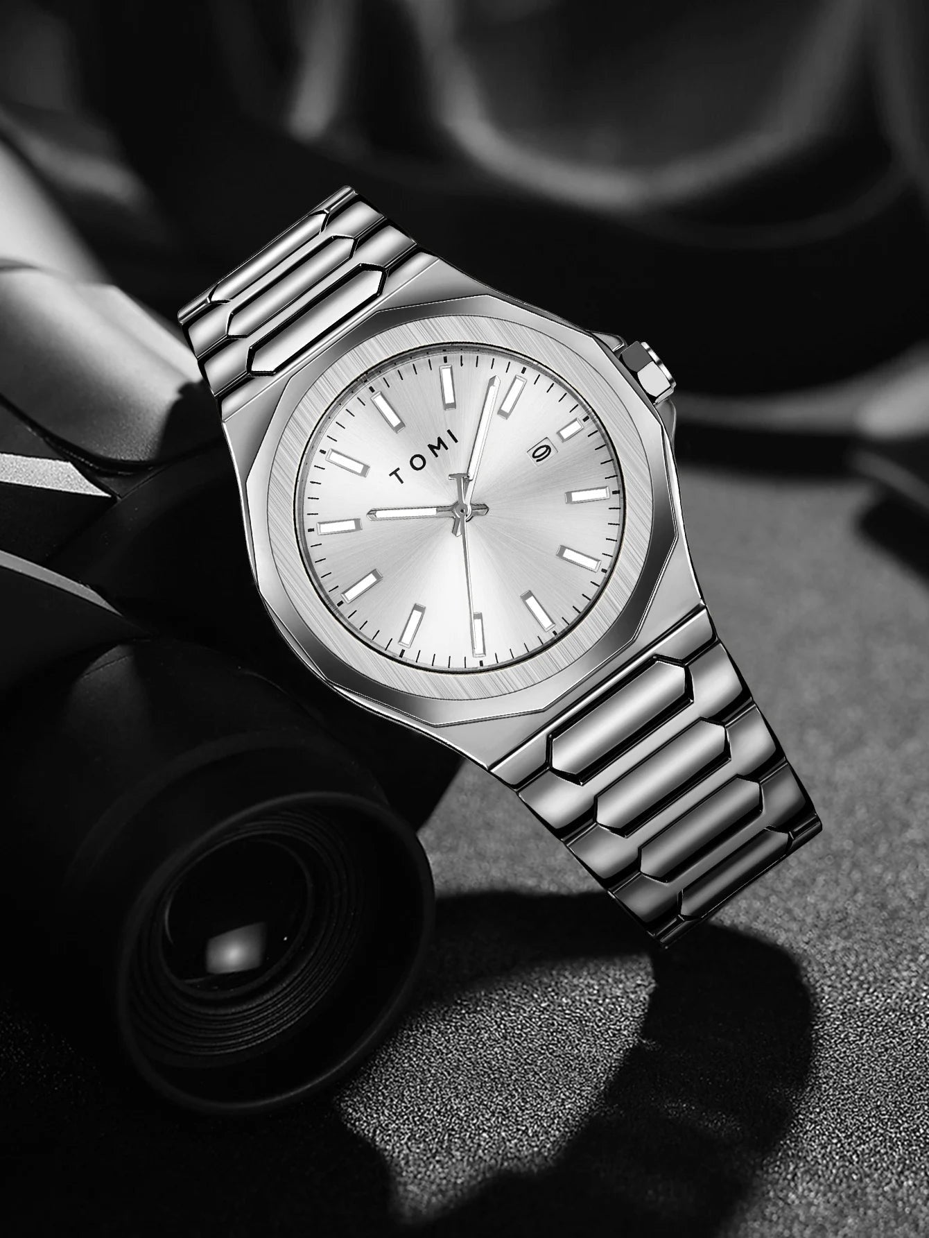 My Store TOMI luxury stainless steel wristwatch with a silver dial and integrated bracelet in a sleek design.